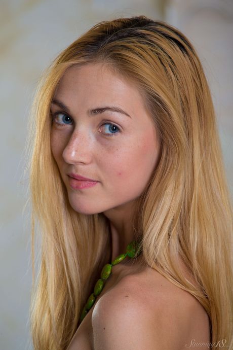 Stunning 18: Redheaded teen Ruby strikes confident nude poses while in her bedroom