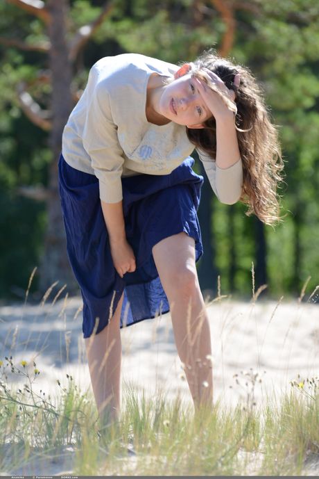 Lean teen Anamika shows her tiny tits and twat