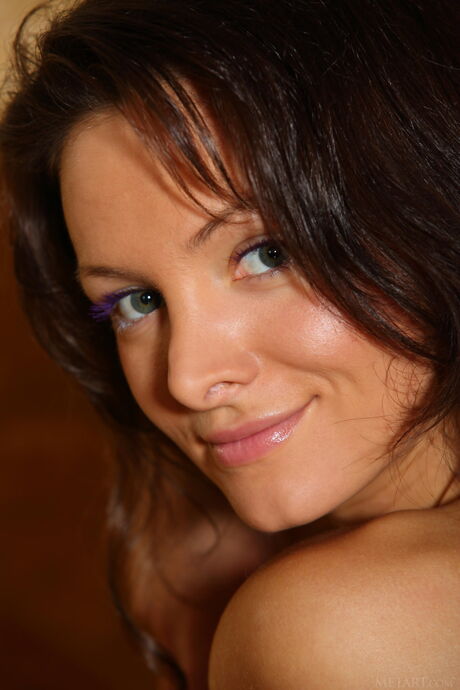 Pretty teen Zhanet A removes her bikini to pose nude in the bathroom