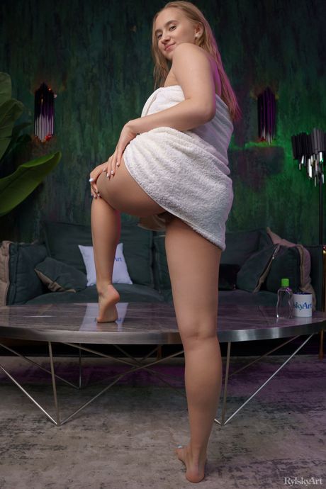 Young beauty Milla takes it all off on a bed with self-assuredness