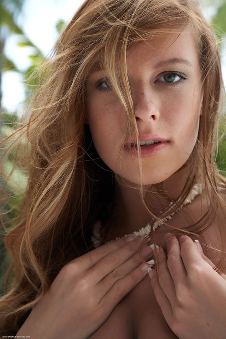 Czech hottie Tubbea flaunting her big tits and bald pussy by the pool