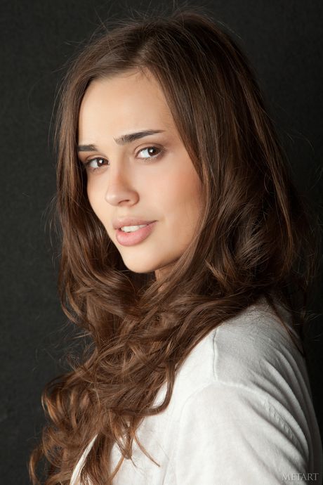 Sexy brunette Trista A reveals her tiny tits and poses naked