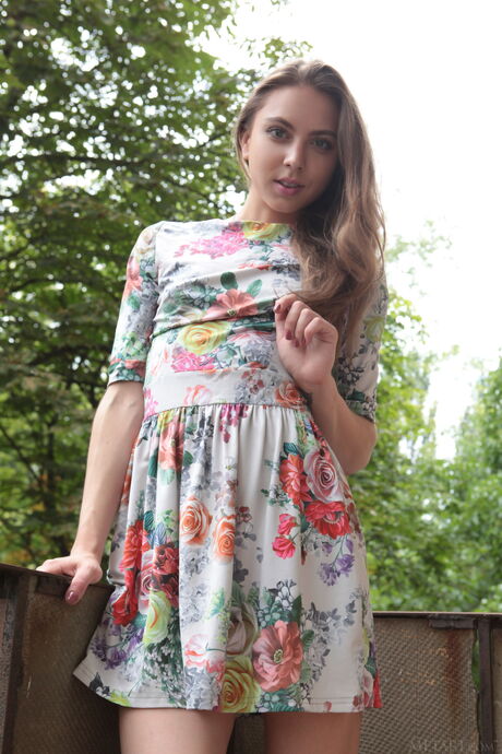 Slender teen Valery Leche shows her big tits and poses naked