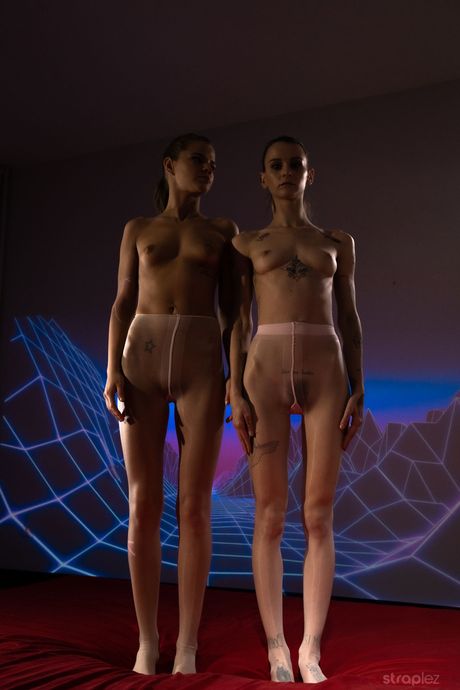 Slender teen girls Adelle Unicorn & Sarah Kay pose nude in pantyhose on a bed