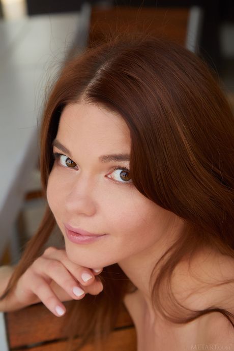 Alluring teen Nedda A removes her clothes and high heels to get naked