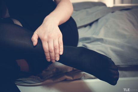 Fiery redhead Lea B bares her shaved, wet and swollen pussy, sinks her fingers inside