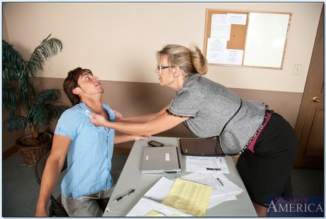 Blonde MILF Jezebel Jones has sex with a student in her classroom