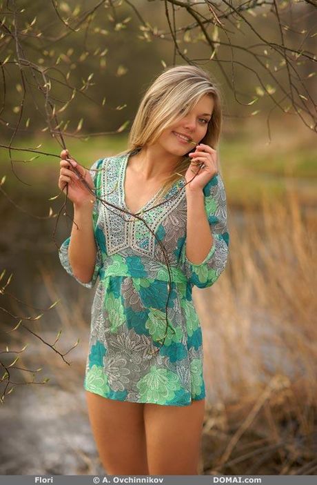 Solo girl Flori gets naked on a country road boldly