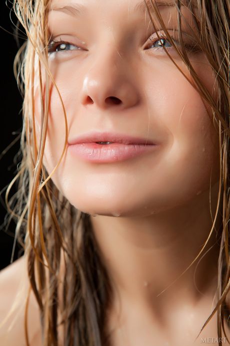 Blonde teen Mia C models totally naked with grace