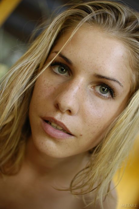 Blonde teen Iveta B models totally naked boldly