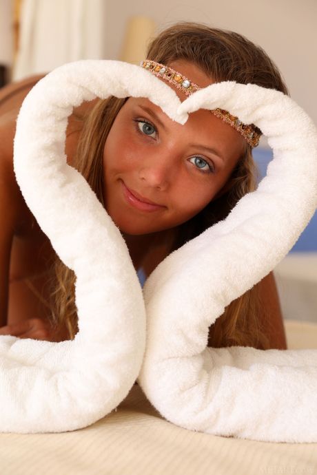 Engaging teen Mango A shows her big tits and poses naked