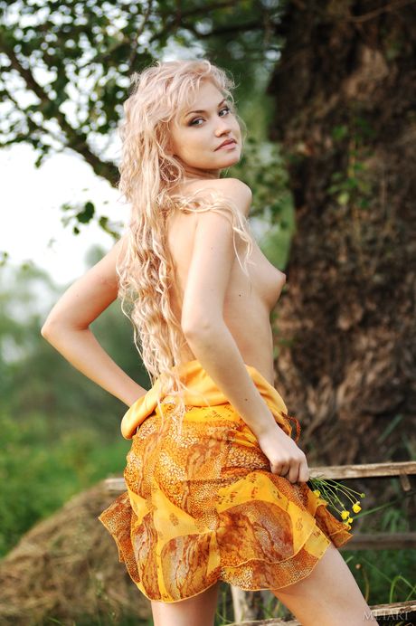 Skinny Ukrainian teen Masha E strips & poses naked in the garden