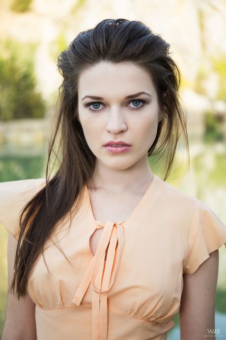 Glamorous teen Serena shows off her shaved pussy & her perfect tits outdoors