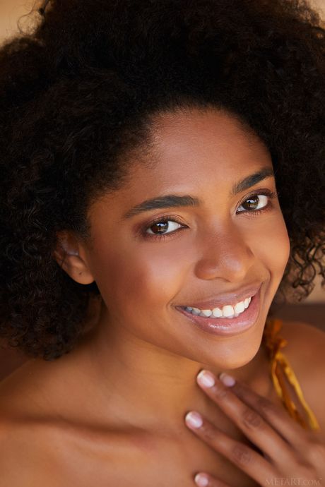 Ebony teen Luna C gets naked in heels to show her hot body