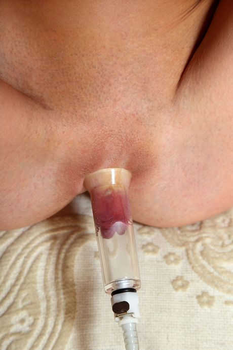 Skinny blonde teen Tallie Lorain pissing and masturbating her pussy