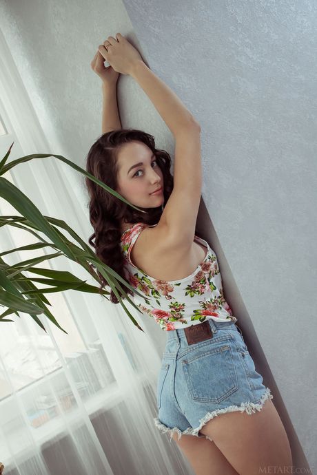 Pure teen Solange removes her bikini and thong to pose nude in her room