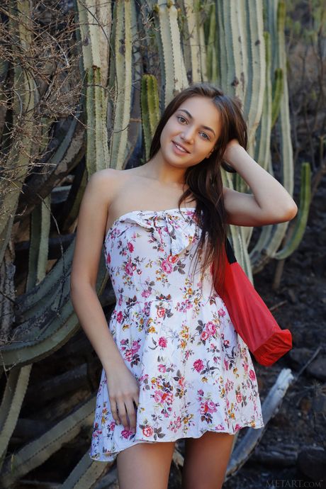 Ukrainian peach Angely Grace gets naked in the desert and poses in the sand