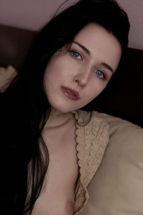 Endearing teen Natali B shows her tight ass and pussy while naked on her bed