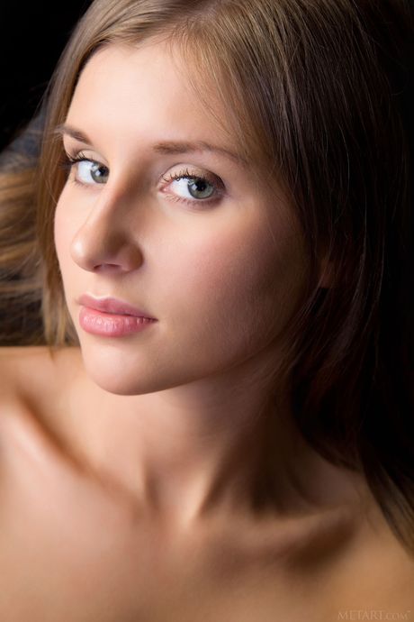 Perfect teen Viva B removes her lingerie to pose nude with self-assuredness