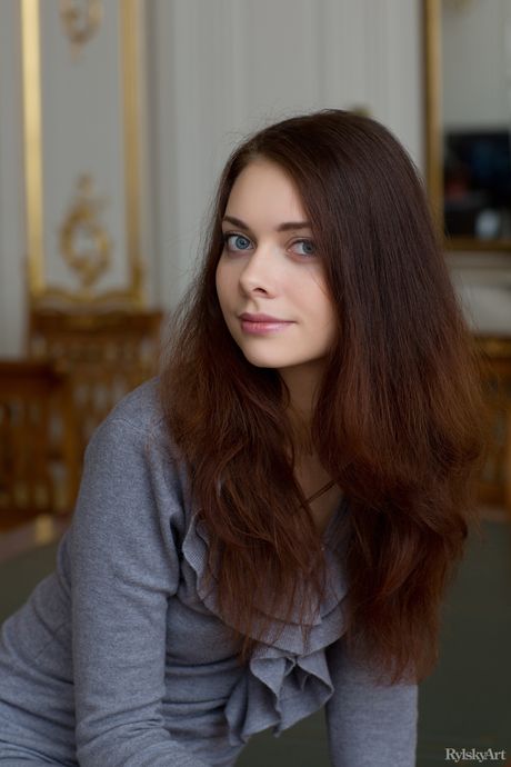 Russian lady Kei strips and poses nude in a solo shoot