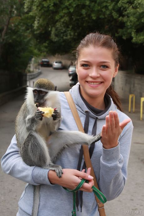 Tempting teen Liza J removes her lingerie and poses naked