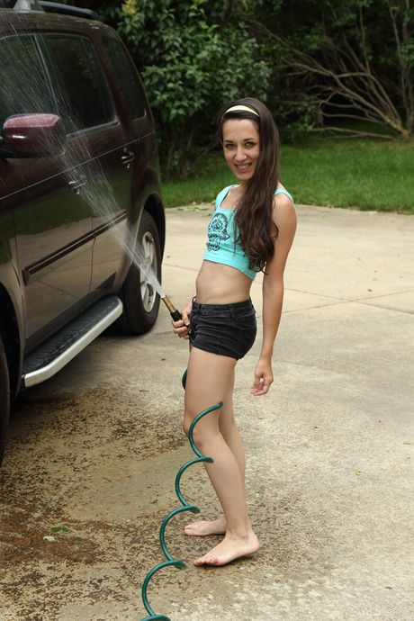 Svelte teen Freya Von Doom pisses on the sidewalk after getting naked