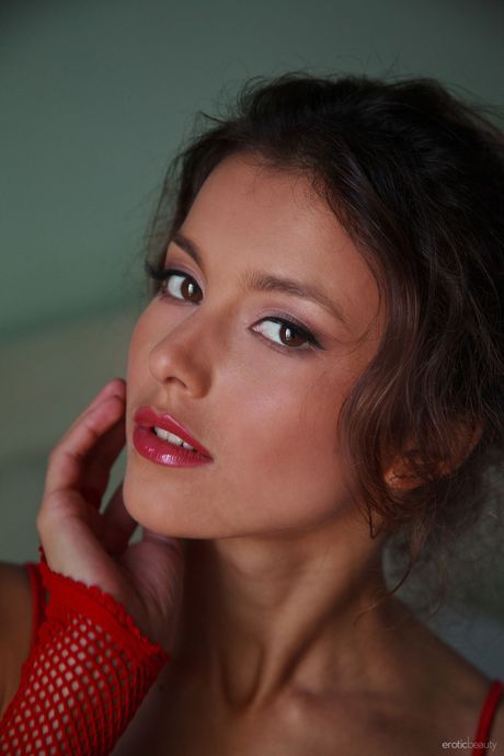 Thin teen Divina A shows her hot ass and pussy in the nude