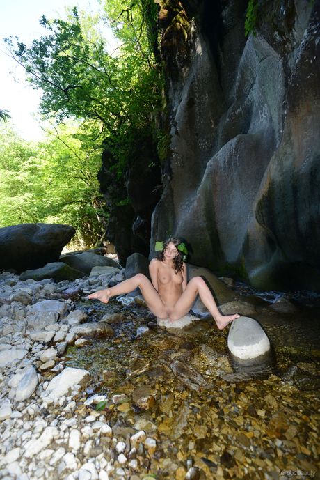 Russian beauty Katoa poses naked in the cave and shows off her sexy body