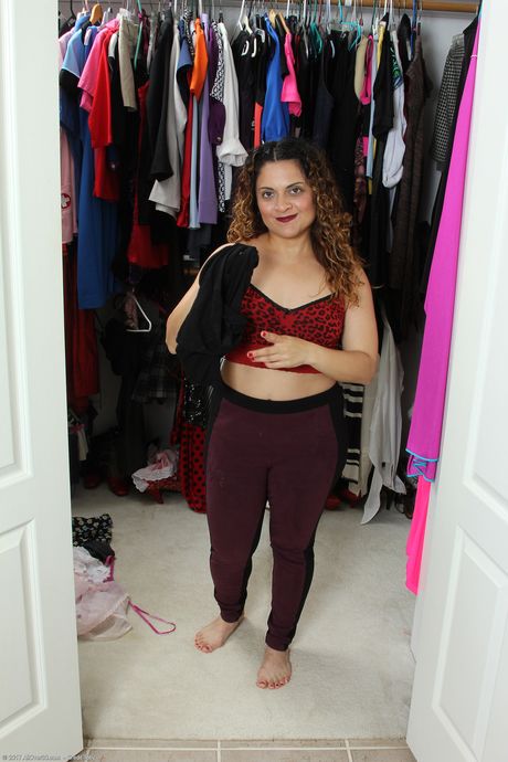 Chubby MILF Drew Jones shows off her big ass and rubs her bush