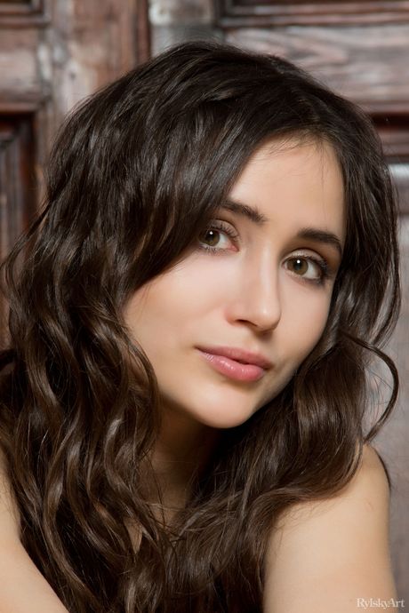 Barely legal girl Cecile highlights her bald pussy while completely naked