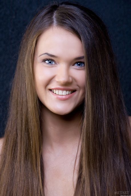 Desirable teen Chantelle A removes her bikini to pose nude