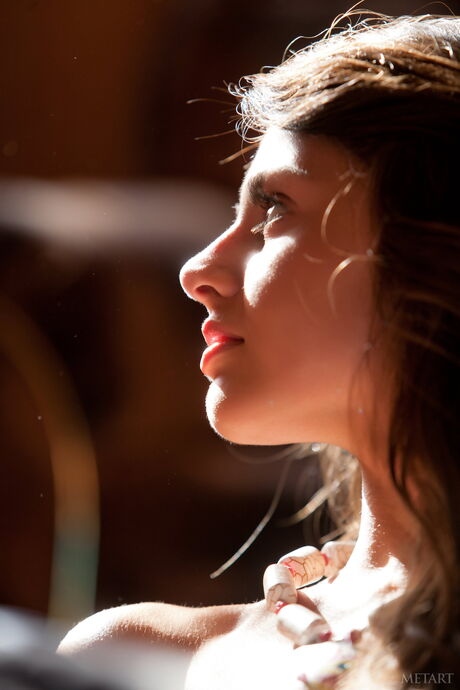 Brunette babe Astrud A flaunting her tiny tits and bald pussy outdoors