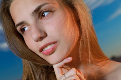 Russian beauty Elle Tan takes it all off in a field of lavender