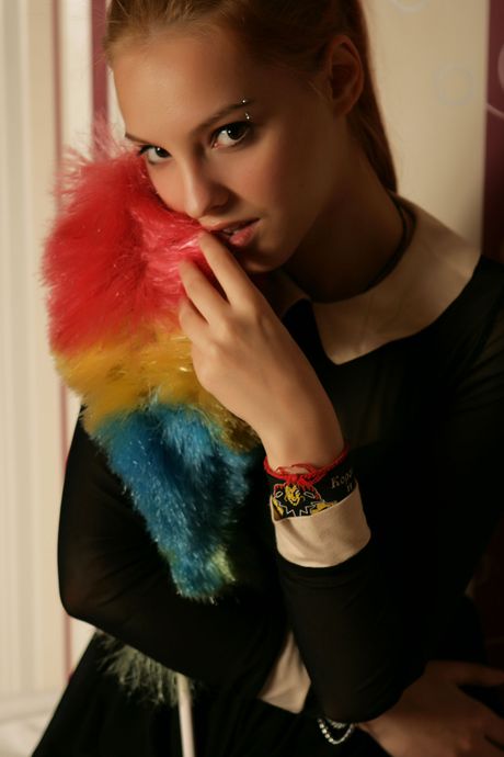 Delicate teen Kira W removes her lingerie to pose nude in a solo shoot