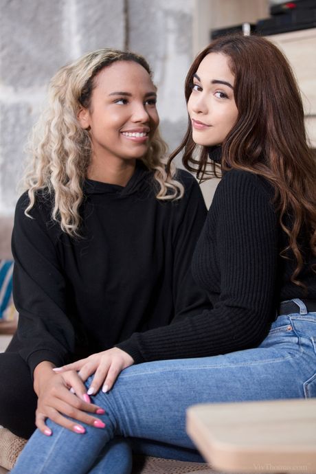 Lesbian girls Romy Indy & Ginebra Bellucci have sex on a patio in yoga pants