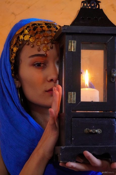 Beautiful young girl Naomi T models totally naked without hesitation