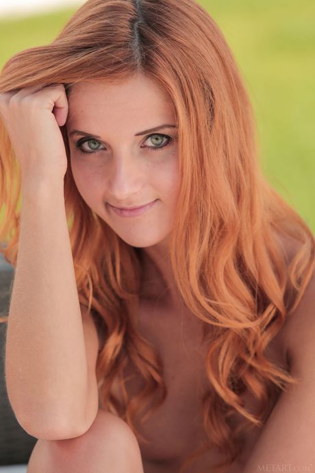 Russian peach Roberta Berti removes her dress and heels to pose nude