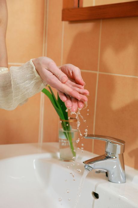 Delicate teen Mika A removes her lingerie and poses naked in the shower