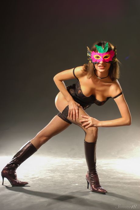 Leah X exhibits her sexy body and flexibility as she poses in her stockings