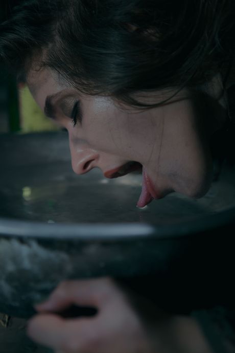 Seductive teenage babe Emily J strips and teases her pussy