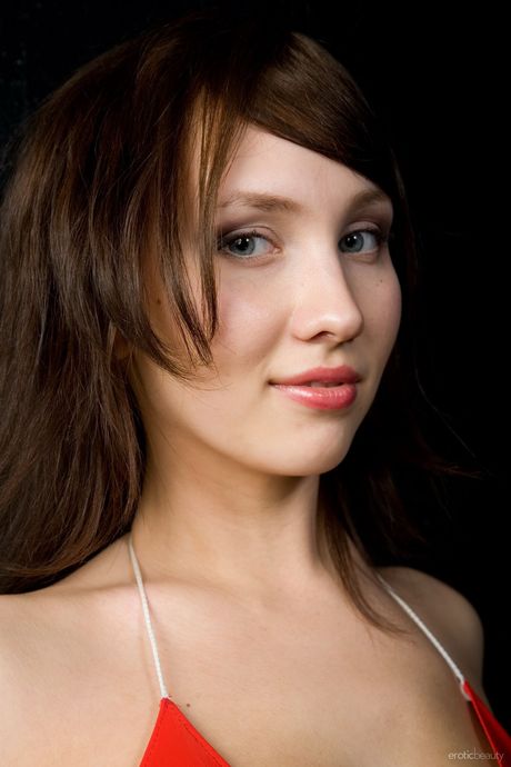 Thin teen Kate strips her red latex bikini & shows her holes & tits