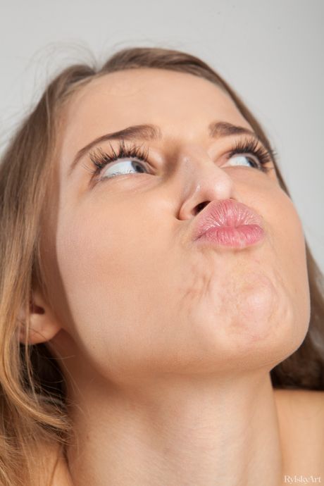 Attractive teen Nikia strips naked and teases with her big ass and tits outdoors