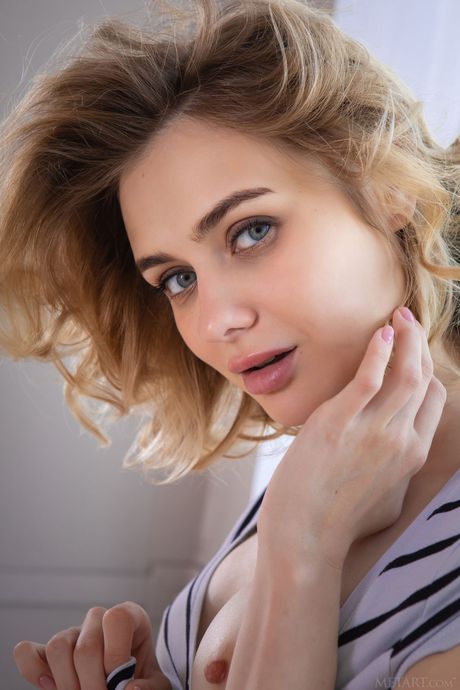 Pretty teen Alice Shea goes naked with conviction