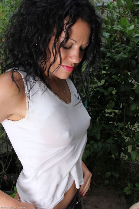 Mature housewife Naira Smith shows her big ass and tasty pussy outdoors