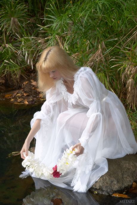 Perfect teen Jane A strips her dress & poses nude in the forest