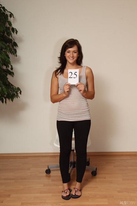 Czech teen Tess Lyndon strips and teases with her big ass and shaved pussy