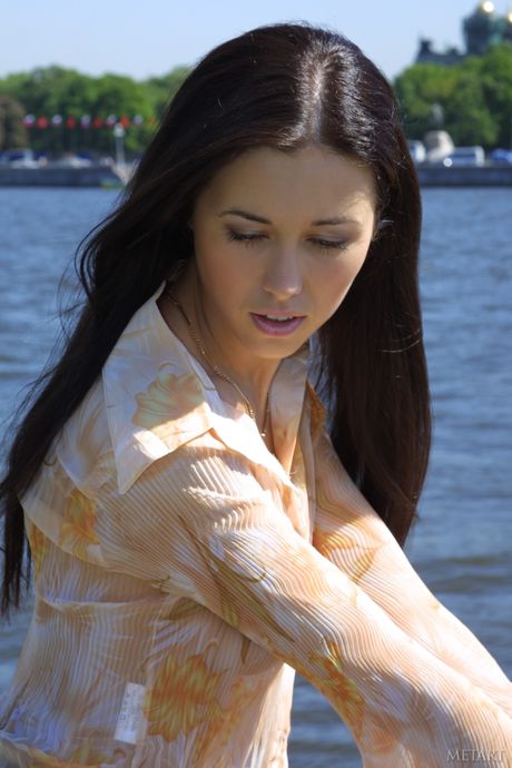 Glamorous teen Corinna B poses naked in the public toilet