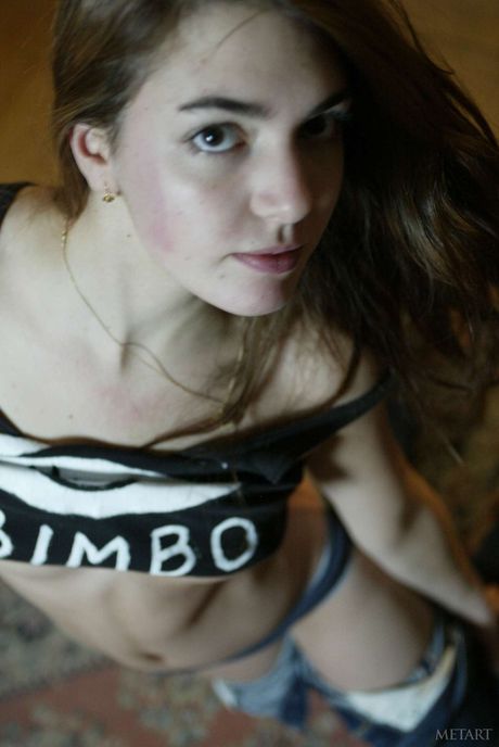 Engaging teen girl with a hot ass and a bald pussy gets naked