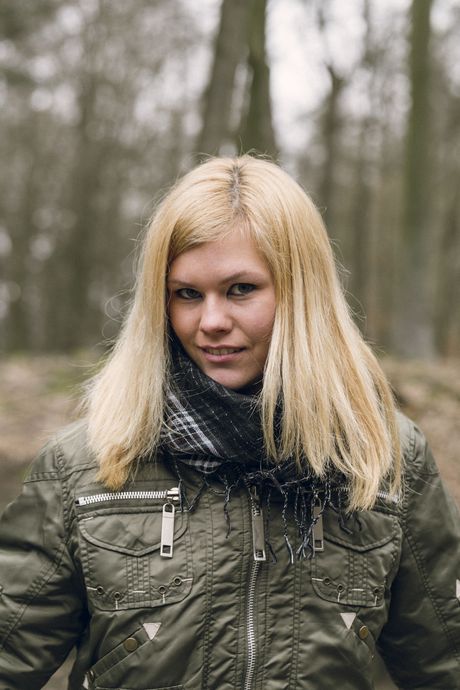 Hot teen Delphine gets naked on a skateboard before fingering her pussy