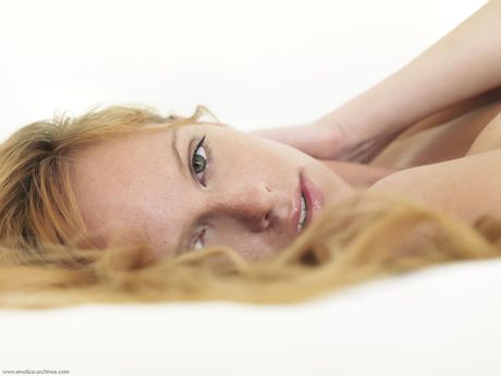 Blonde teen Tubbea strikes great solo poses while completely naked